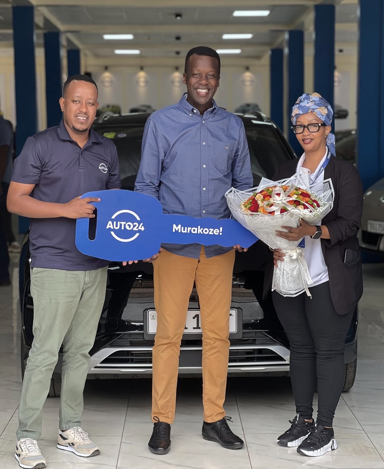 Smiling BYD customer in showroom